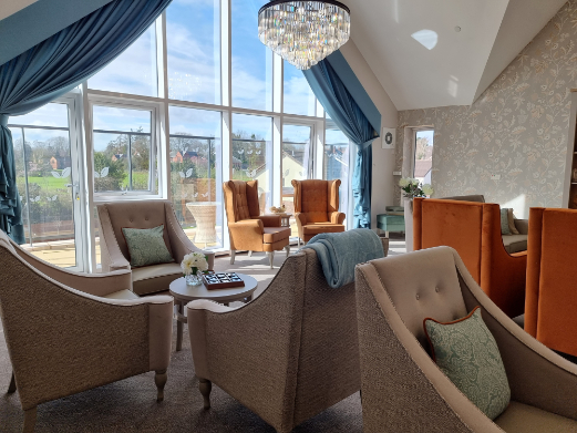 a sunny lounge and balcony area